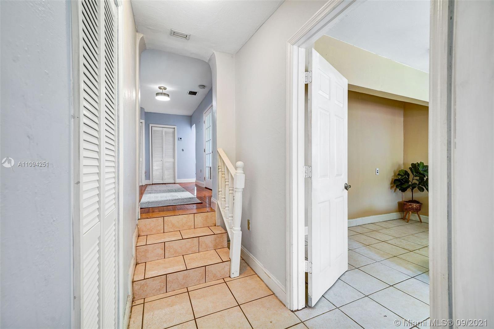 1431 Southwest 20th Street Miami, FL 33145 - Photo 19 of 32 a view of a hallway to closet and a livingroom
