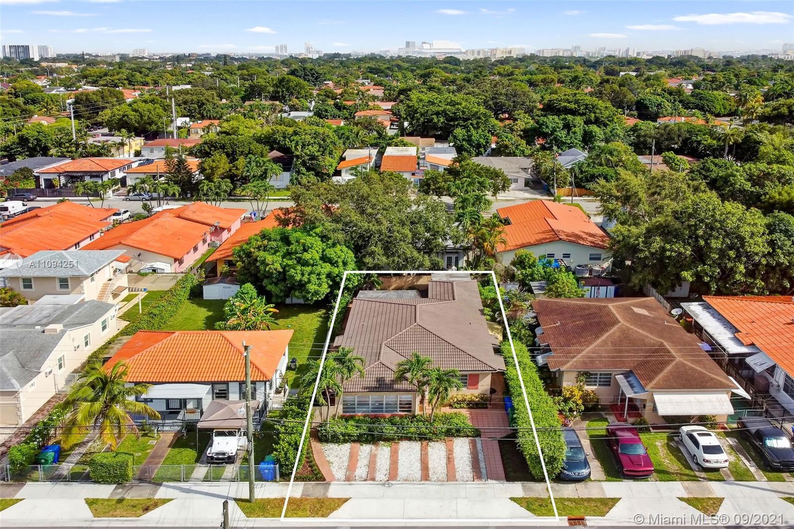 1431 Southwest 20th Street Miami, FL 33145 - Photo 3 of 32 an aerial view of residential houses and street