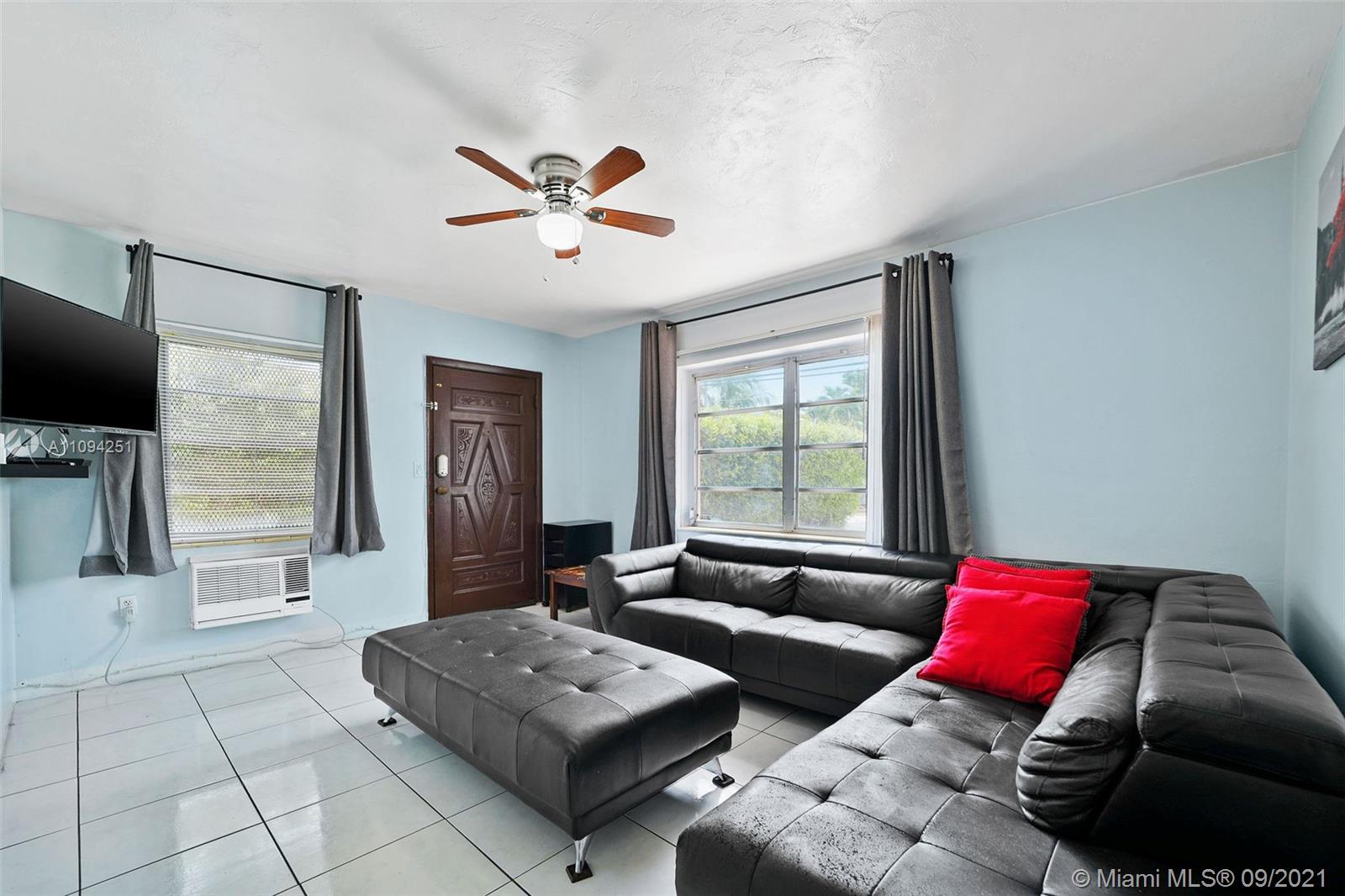 1431 Southwest 20th Street Miami, FL 33145 - Photo 25 of 32 a living room with furniture and a window