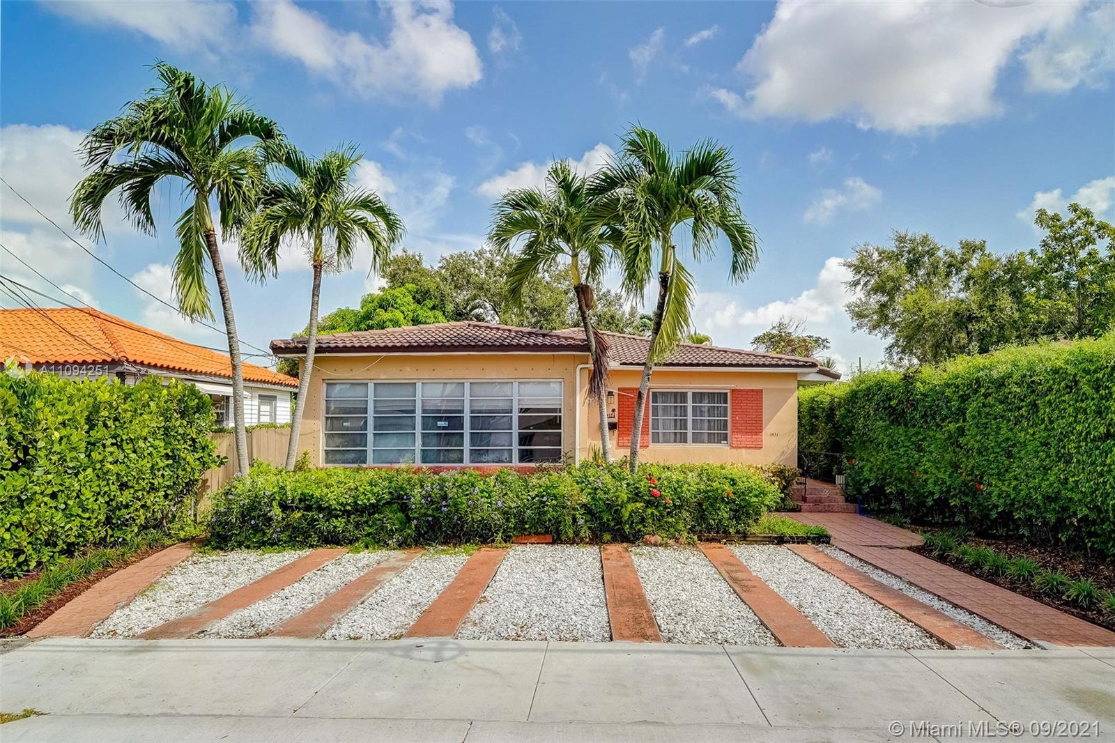 1431 Southwest 20th Street Miami, FL 33145 - Photo 6 of 32 a front view of house with yard and green space