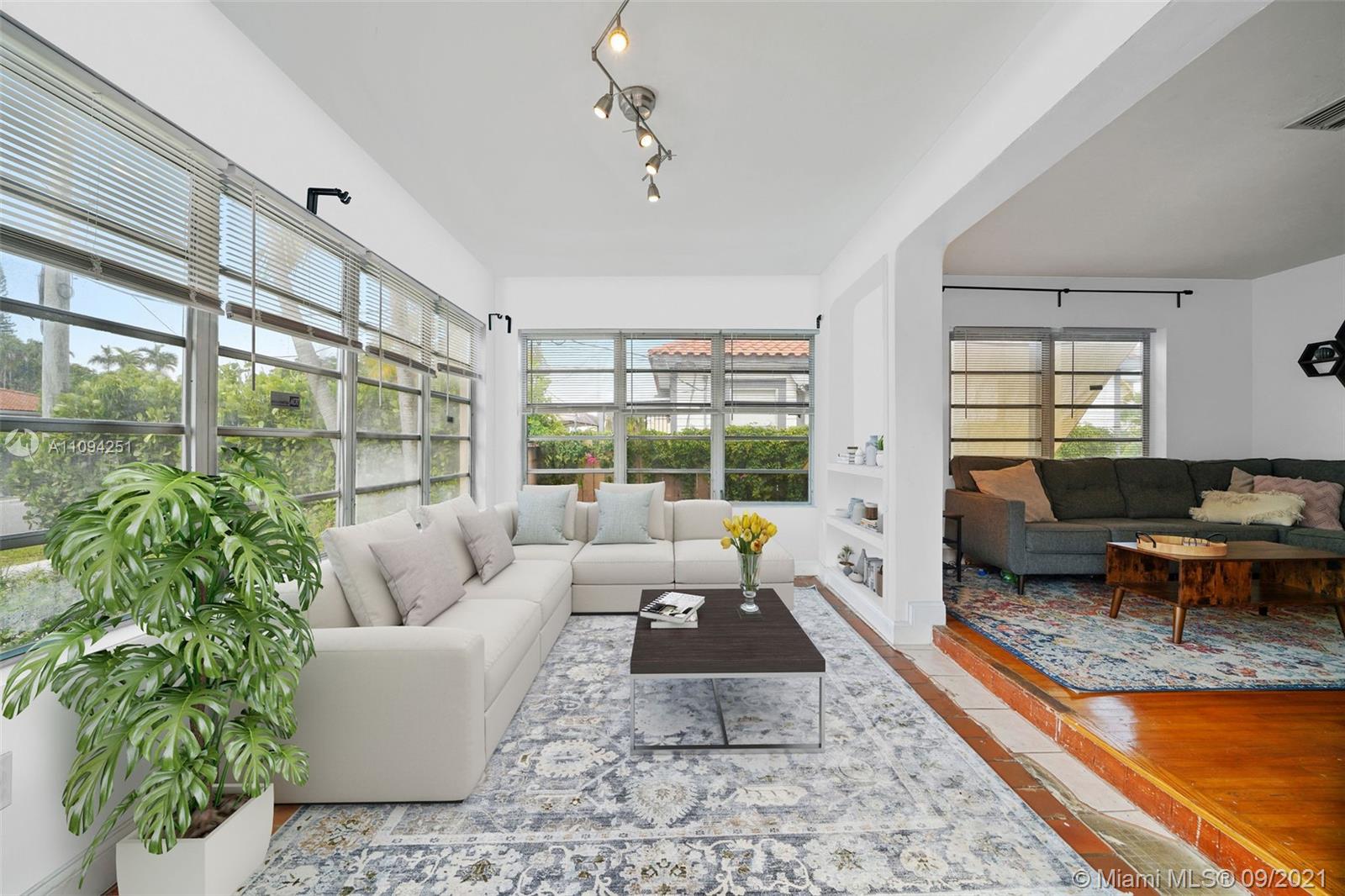 1431 Southwest 20th Street Miami, FL 33145 - Photo 8 of 32 a living room with patio furniture and a large window