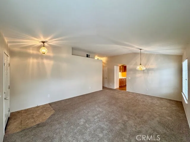 a view of empty room with windows