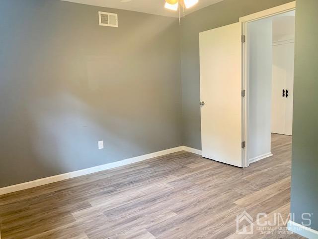 20 Sherwood Road Edison, NJ 08820 - Photo 16 of 26 a view of a room with wooden floor