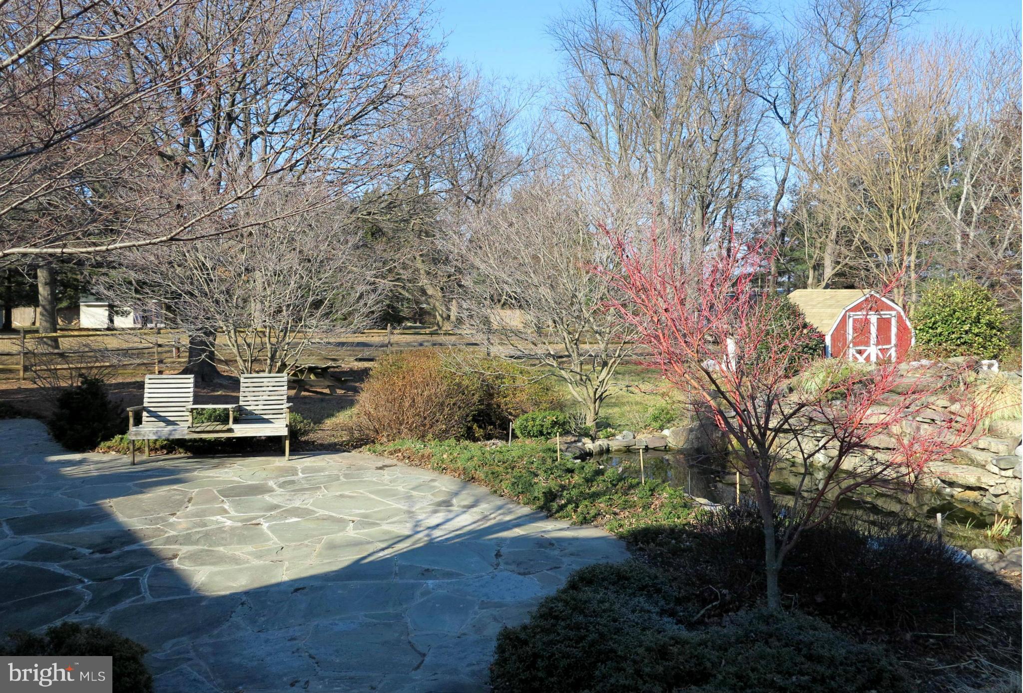 8045 Murphy Road Fulton, MD 20759 - Photo 26 of 30 The Gorgeous Flagstone Terrace and Waterfall