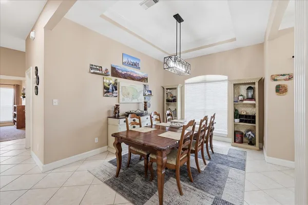 a view of a dining room with furniture
