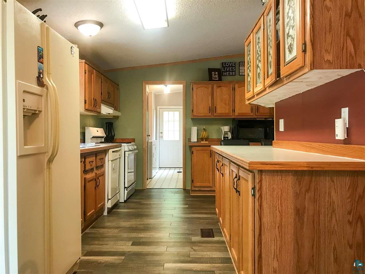 6661 Halseth Road Saginaw, MN 55779 - Photo 4 of 16 Kitchen with new flooring