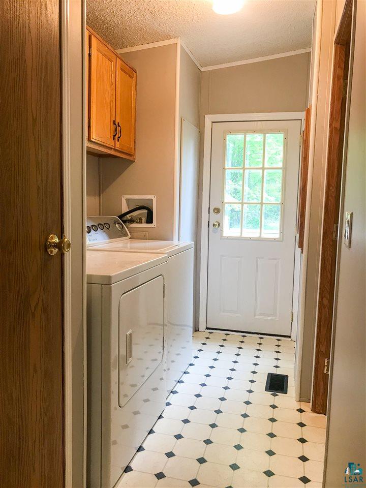 6661 Halseth Road Saginaw, MN 55779 - Photo 5 of 16 Main floor laundry near back entry
