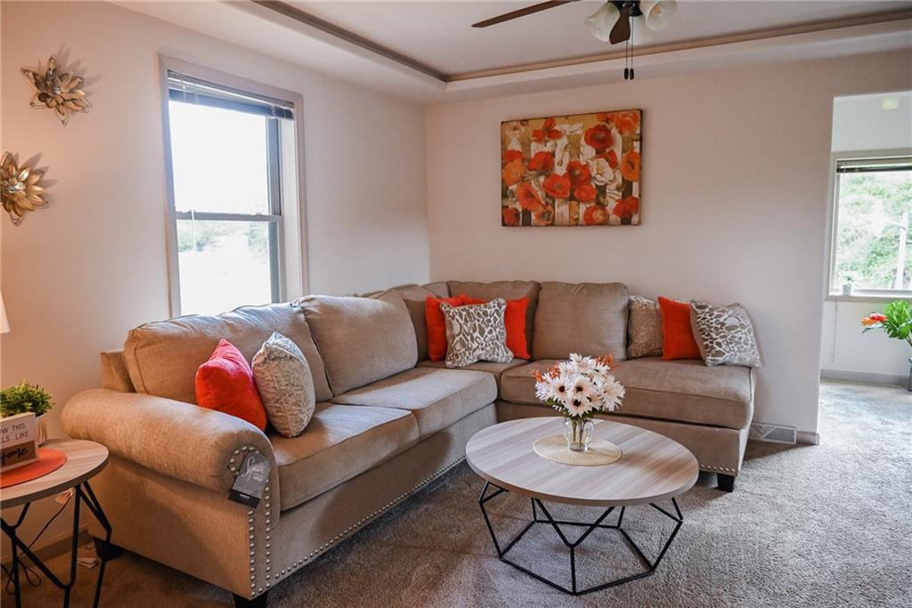 447 Rte 422 Butler, PA 16002 - Photo 11 of 32 a living room with furniture a rug and a window