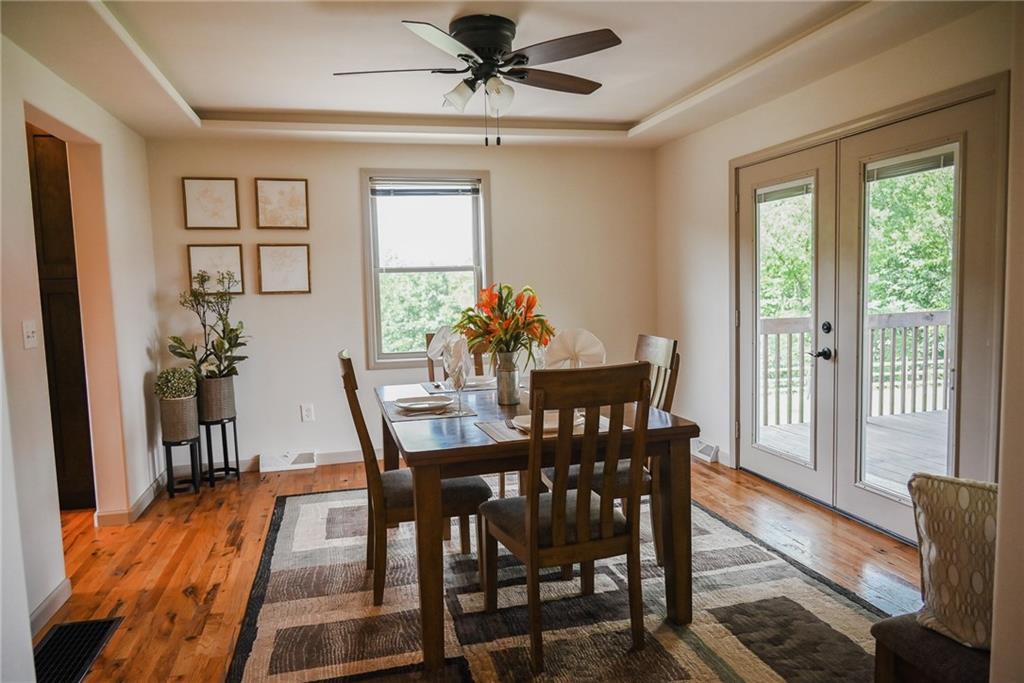 447 Rte 422 Butler, PA 16002 - Photo 15 of 32 a view of a dining room with furniture window and wooden floor