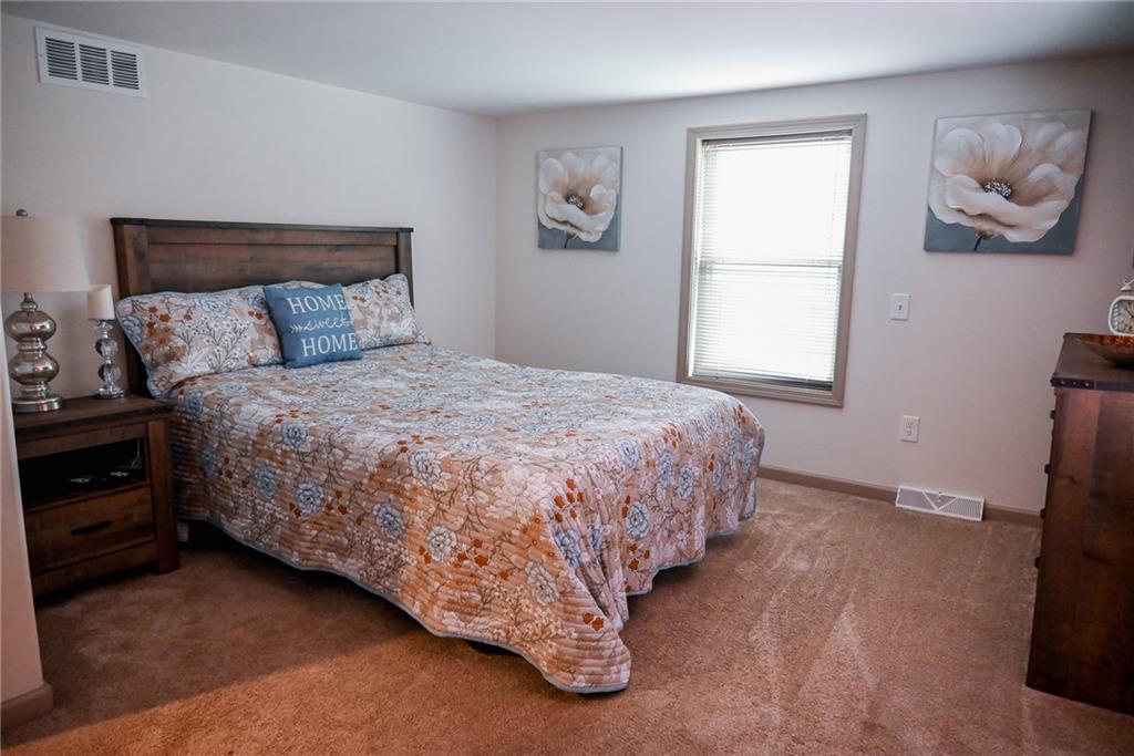 447 Rte 422 Butler, PA 16002 - Photo 20 of 32 a bedroom with a bed and window