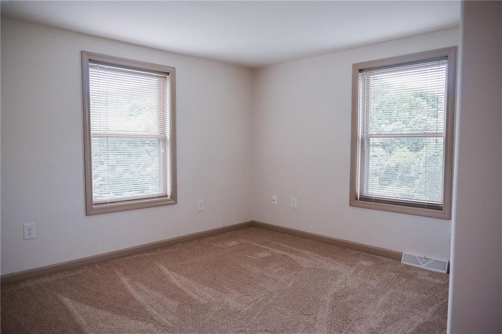 447 Rte 422 Butler, PA 16002 - Photo 25 of 32 an empty room with a window