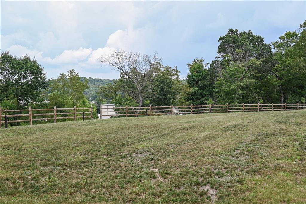 447 Rte 422 Butler, PA 16002 - Photo 32 of 32 a view of a green field with wooden fence