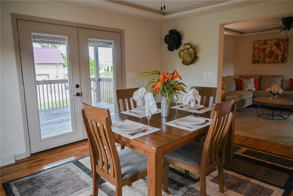 447 Rte 422 Butler, PA 16002 - Photo 10 of 32 a view of a dining room with furniture window and wooden floor