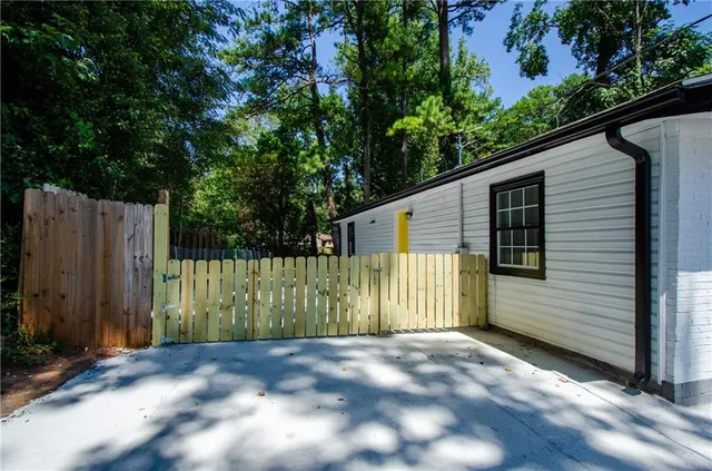 a view of backyard and tree
