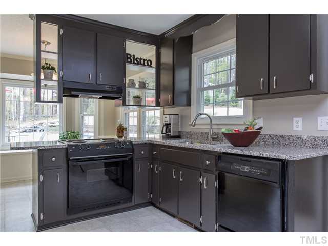 7929 Secluded Acres Road Apex, NC 27523 - Photo 4 of 16 Another view of the Kitchen and the beautiful GRANITE counter tops. The MUD ROOM and Laundry are off the kitchen too.