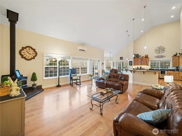a living room with furniture and a table