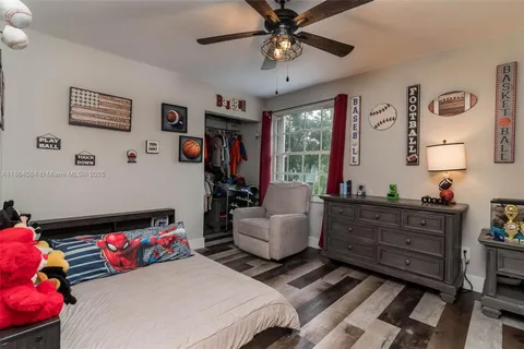 a bedroom with furniture and a bed