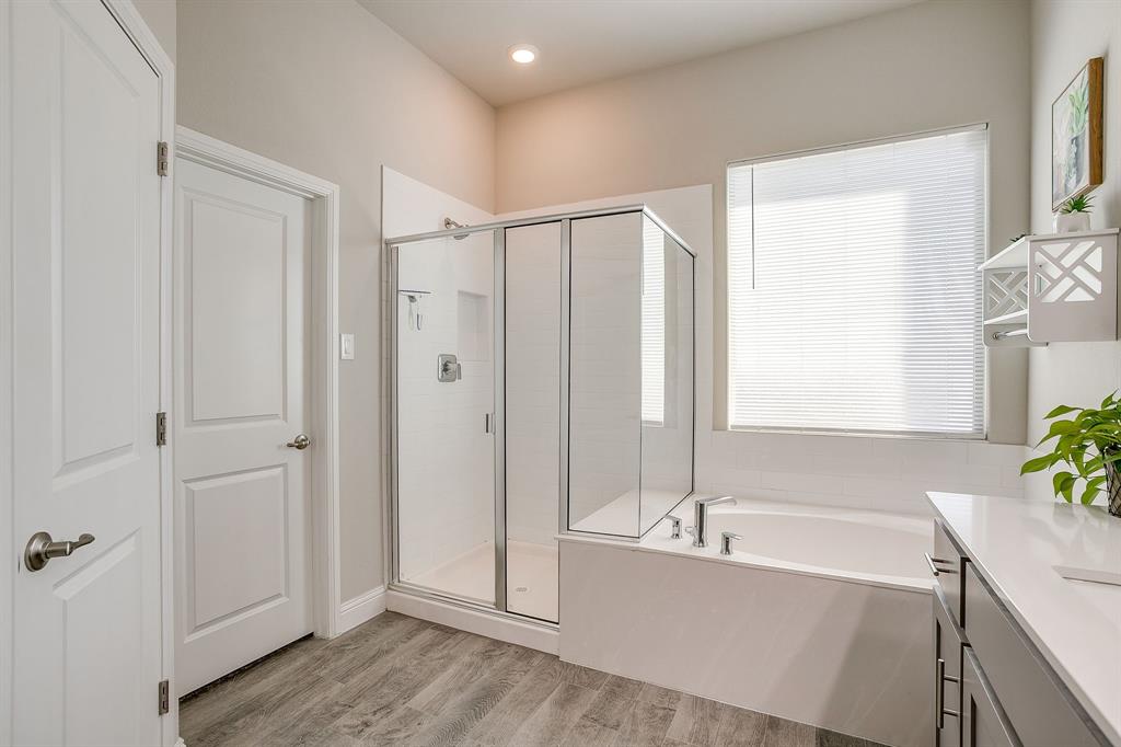 10108 Walnut Rdg Drive Grand Prairie, TX 76065 - Photo 12 of 21 view of bathroom with bathtub and shower