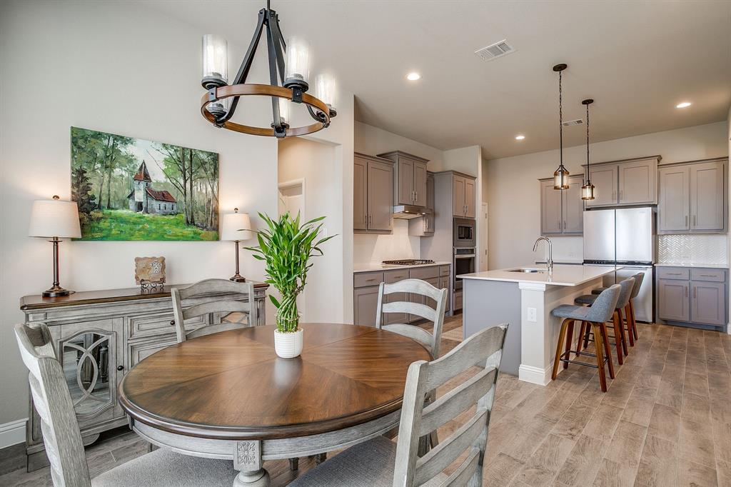 10108 Walnut Rdg Drive Grand Prairie, TX 76065 - Photo 8 of 21 a dining room with furniture and window