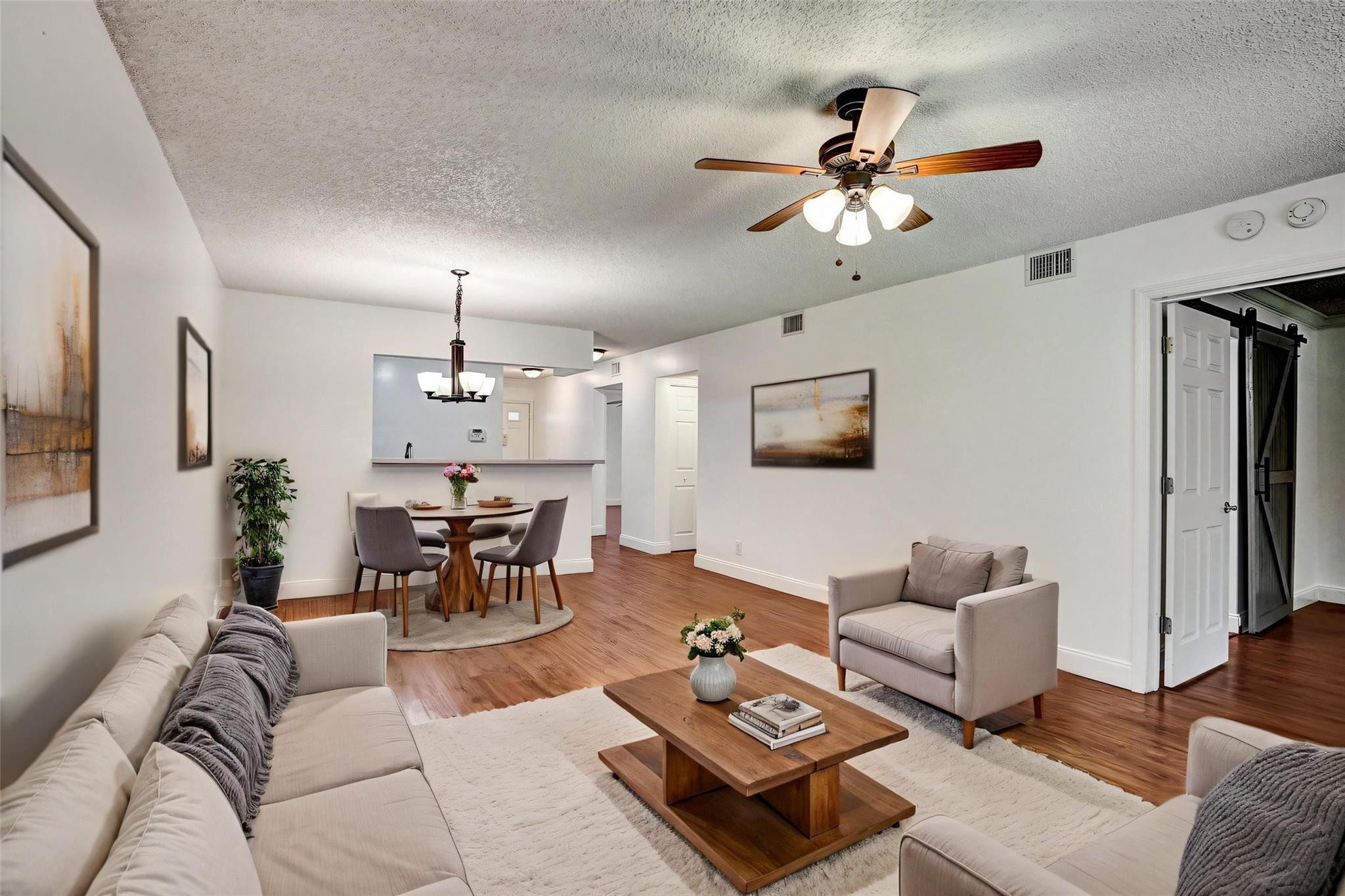 9215 Flynn Circle, Unit 6 Boca Raton, FL 33496 - Photo 12 of 34 Virtually Staged Living room/Dining room