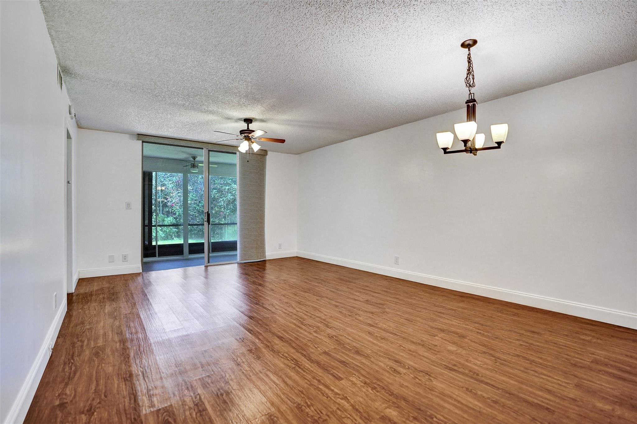 9215 Flynn Circle, Unit 6 Boca Raton, FL 33496 - Photo 9 of 34 Living room/dining room