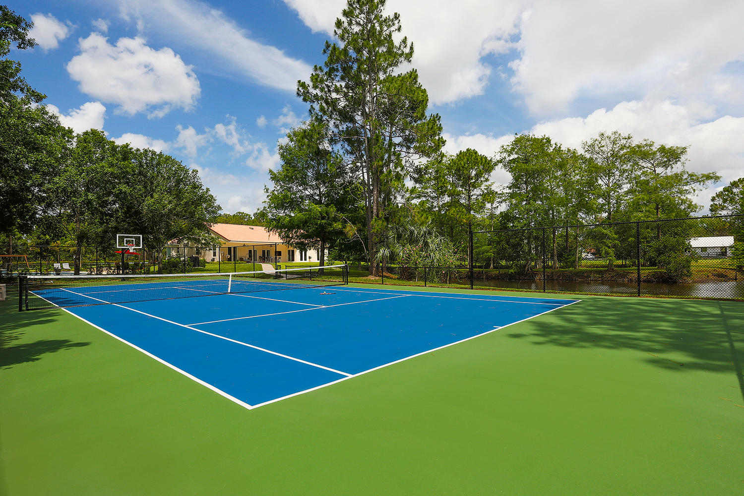 5260 Homeland Road Lake Worth, FL 33449 - Photo 28 of 33 04_TennisCourt copy
