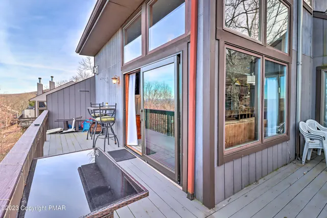 a view of a living room from a balcony