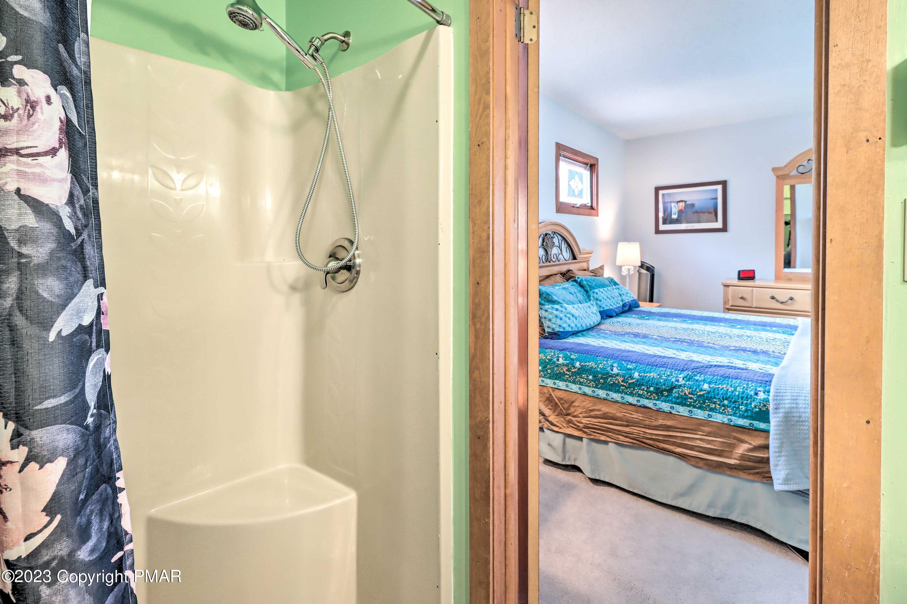 296 Overlook Way Tannersville, PA 18372 - Photo 19 of 44 a bathroom with a granite countertop sink and a mirror