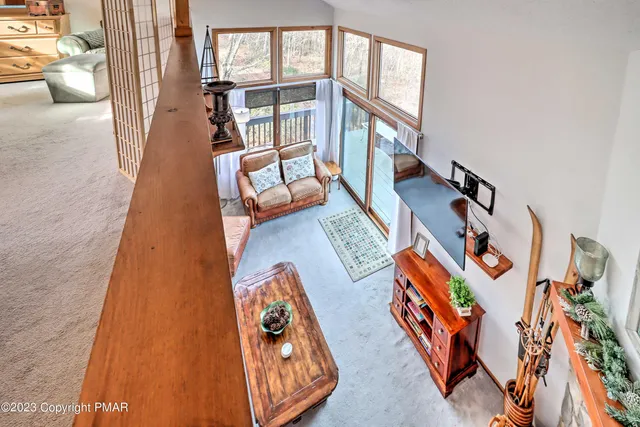 a view of swimming pool with seating space