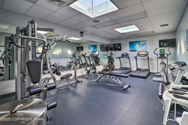 a view of a room with gym equipment