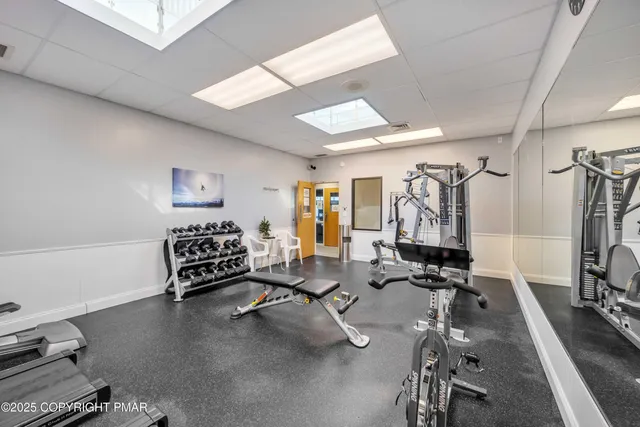 a view of a room with gym equipment