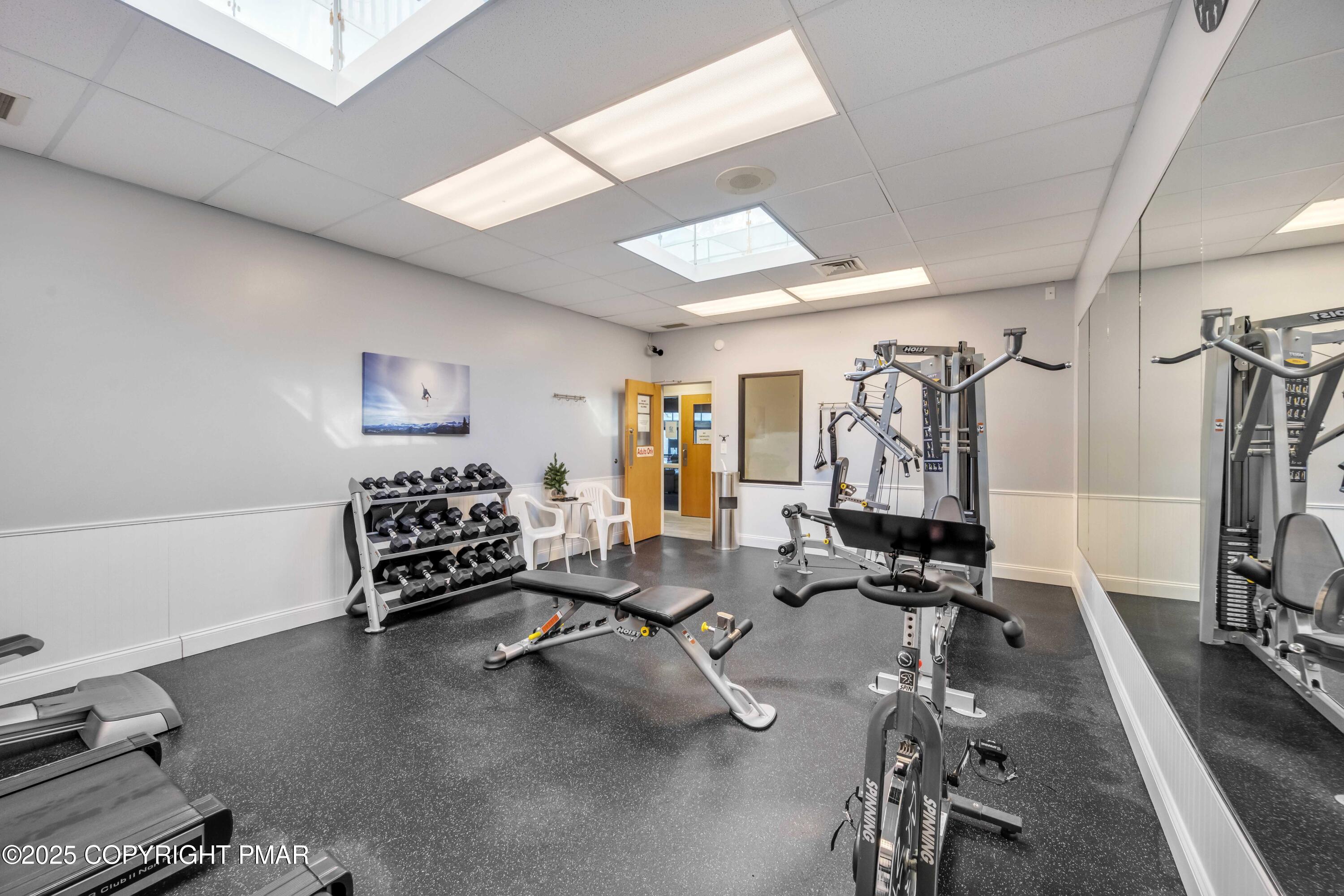 296 Overlook Way Tannersville, PA 18372 - Photo 36 of 44 a room with gym equipment and a table