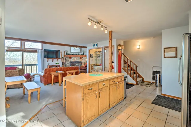 a view of a living room and dining room