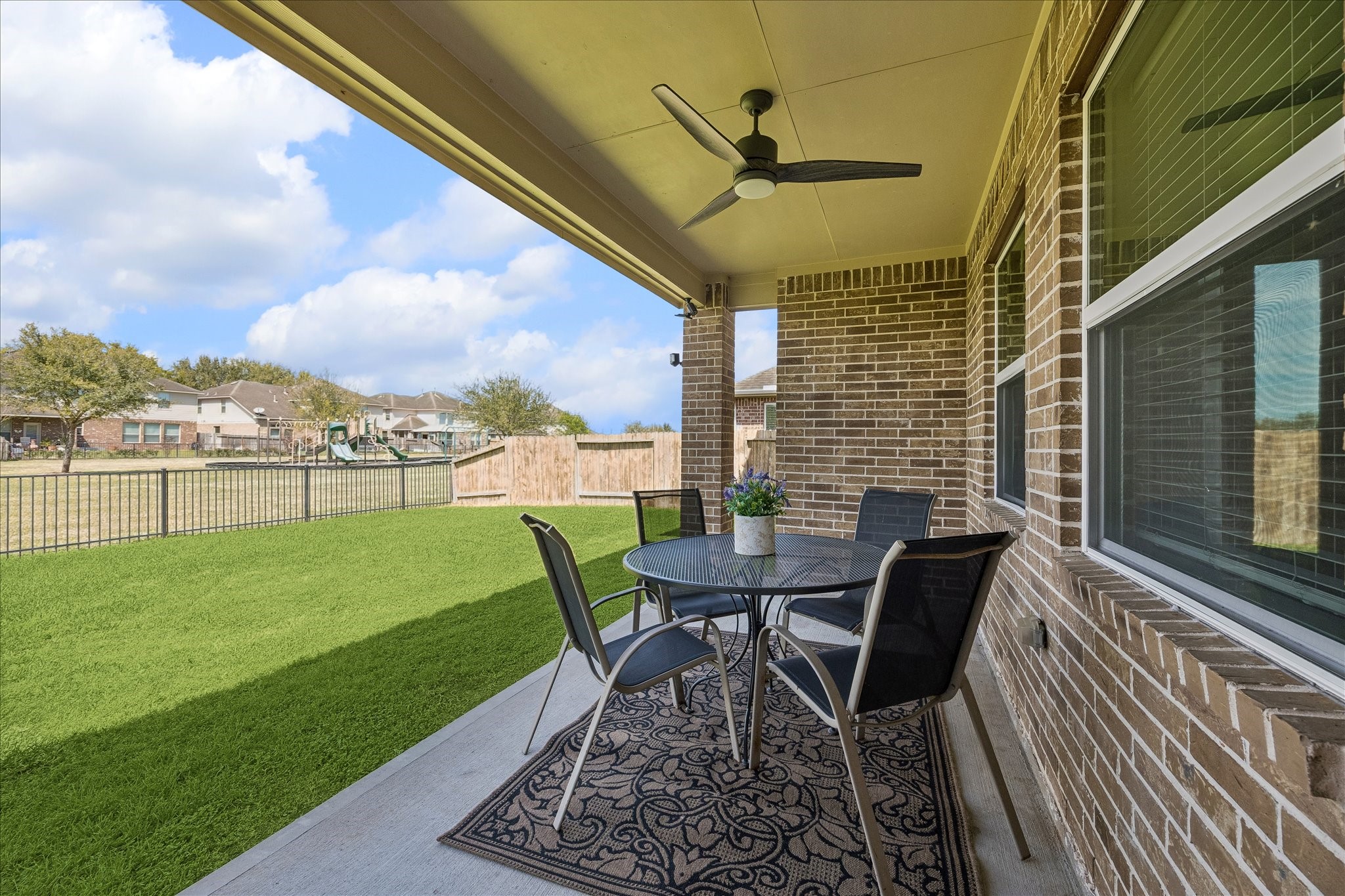 5922 Watford Bend Rosenberg, TX 77471 - Photo 4 of 34 a view of a porch with furniture and a yard