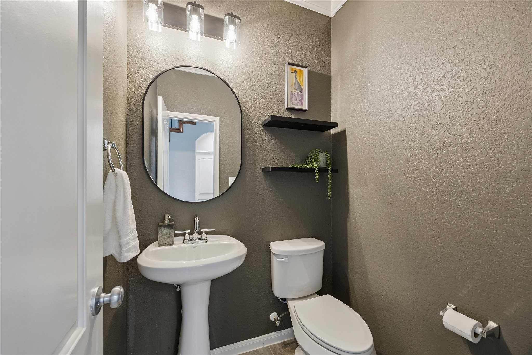 5922 Watford Bend Rosenberg, TX 77471 - Photo 5 of 34 a bathroom with a toilet sink and mirror