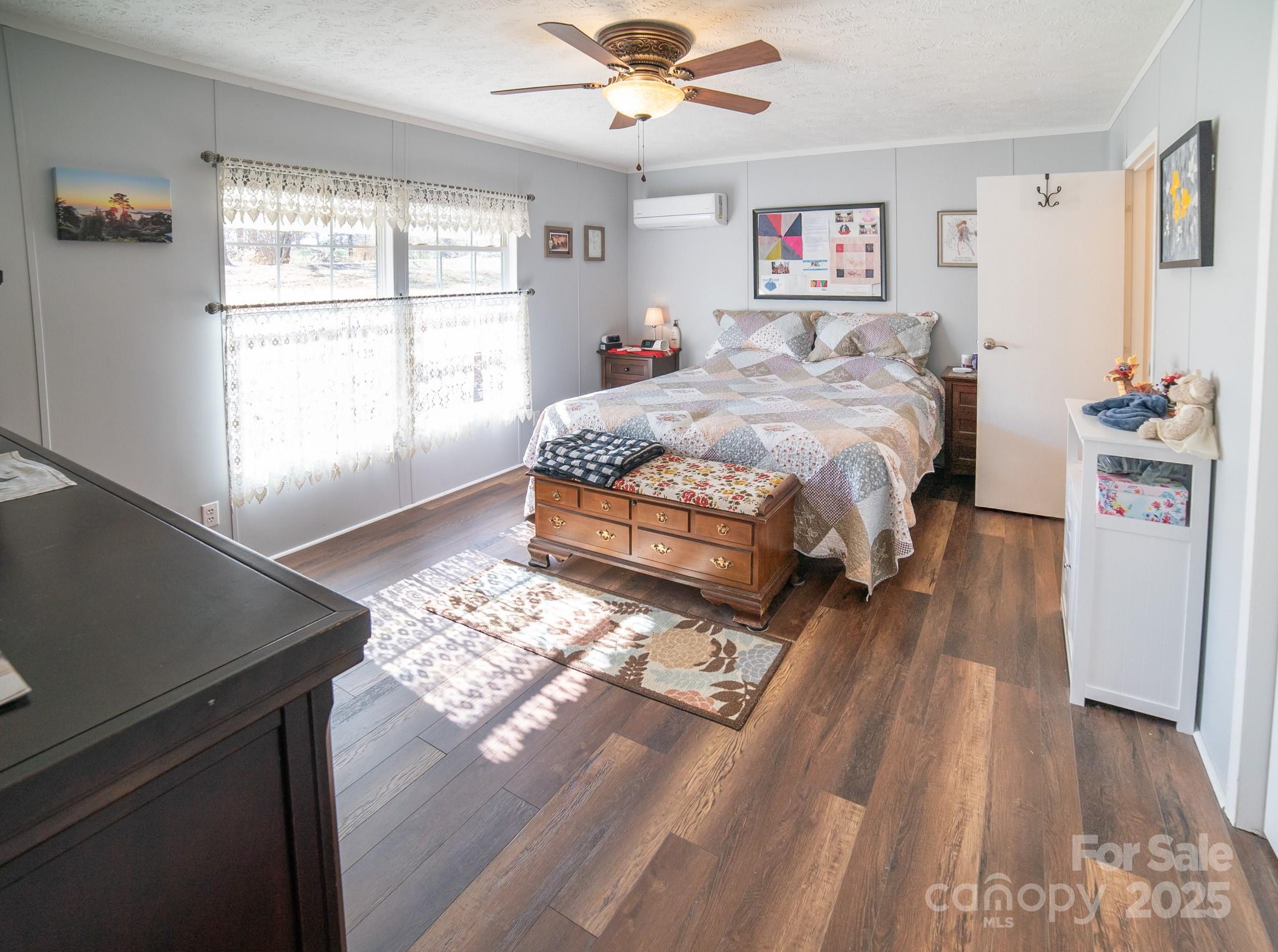 3122 Vance Denton Road Morganton, NC 28655 - Photo 13 of 42 a bedroom with a bed and a window