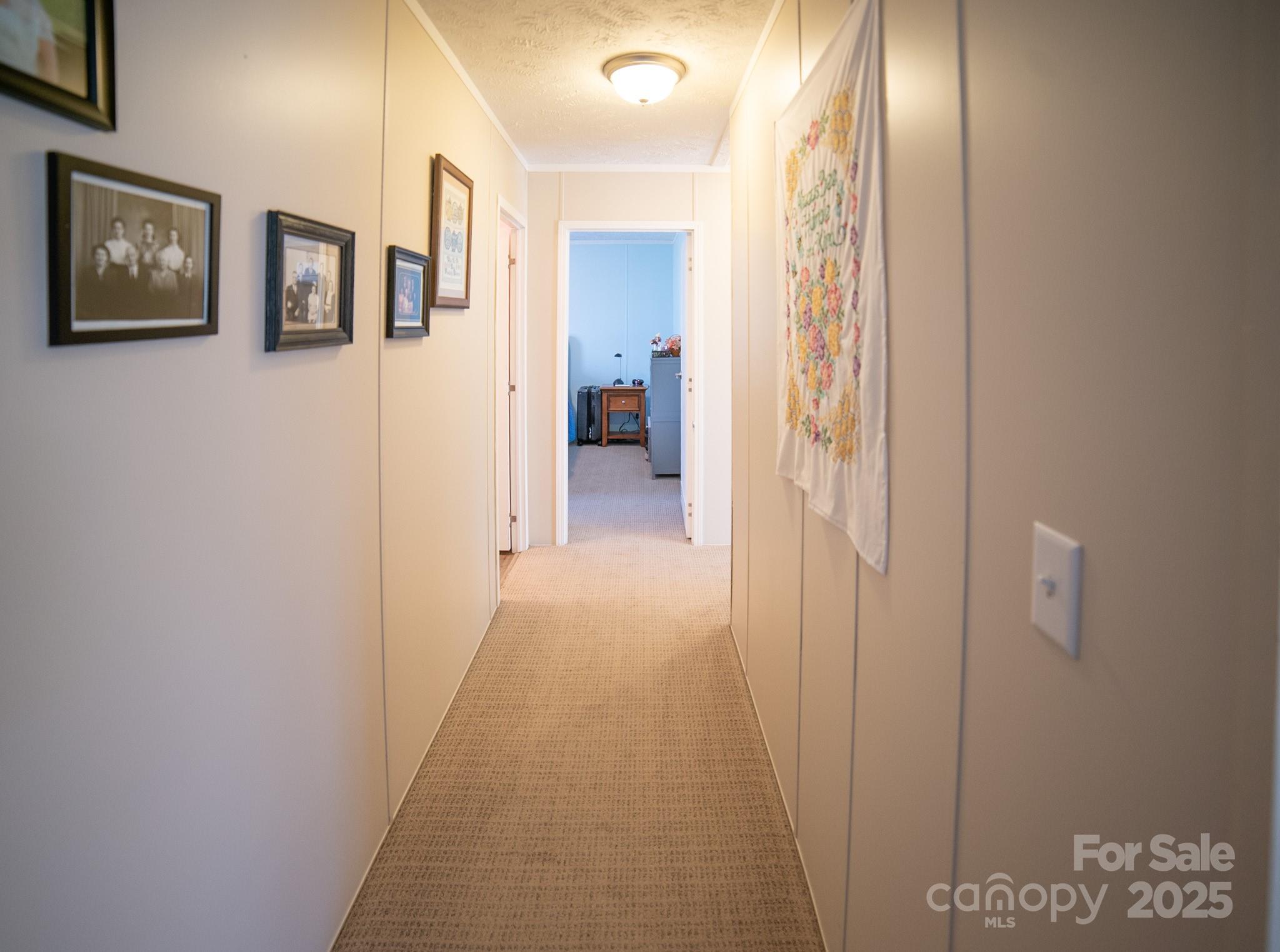 3122 Vance Denton Road Morganton, NC 28655 - Photo 28 of 42 a view of a hallway with wooden floor