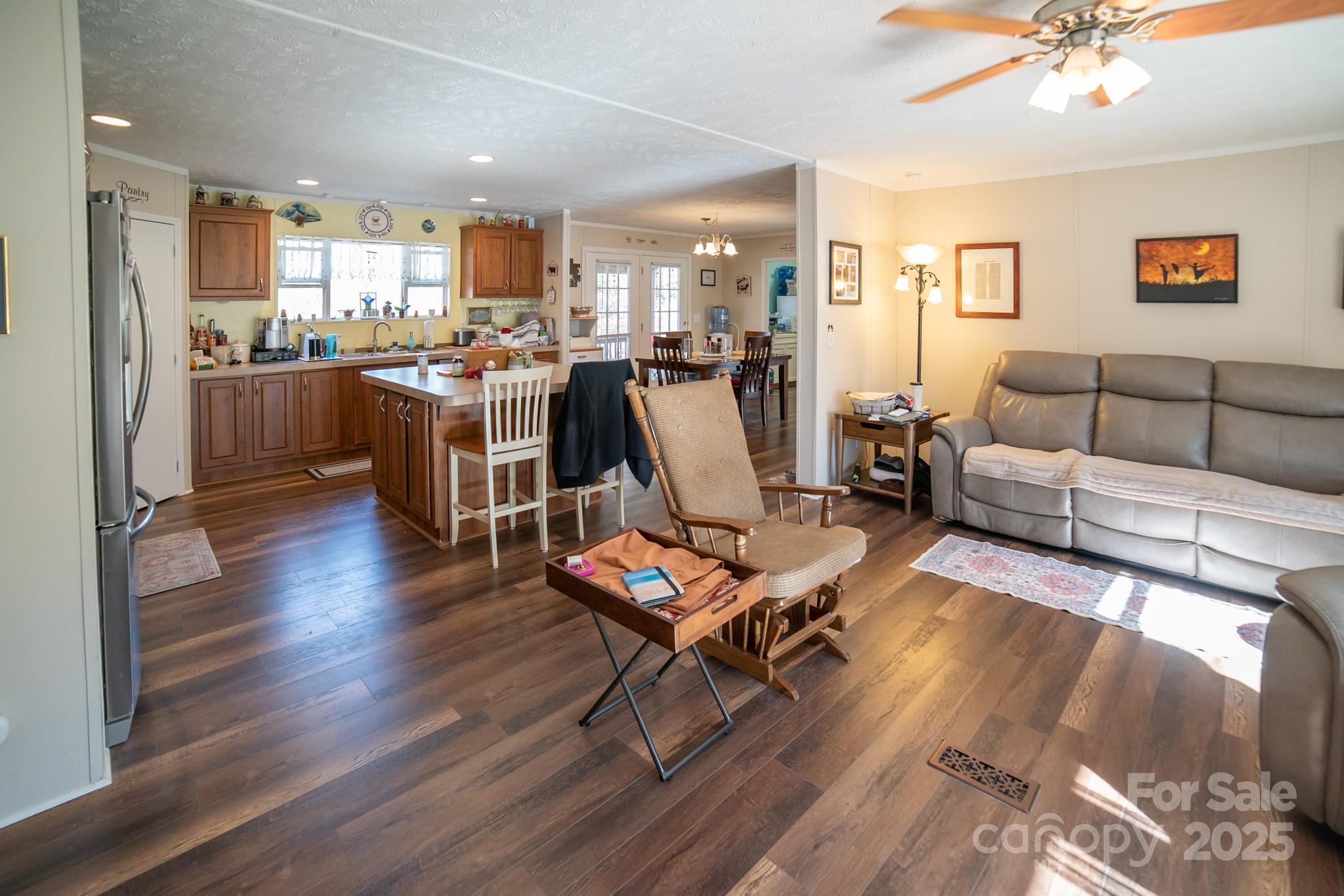 3122 Vance Denton Road Morganton, NC 28655 - Photo 3 of 42 a living room with furniture and kitchen view