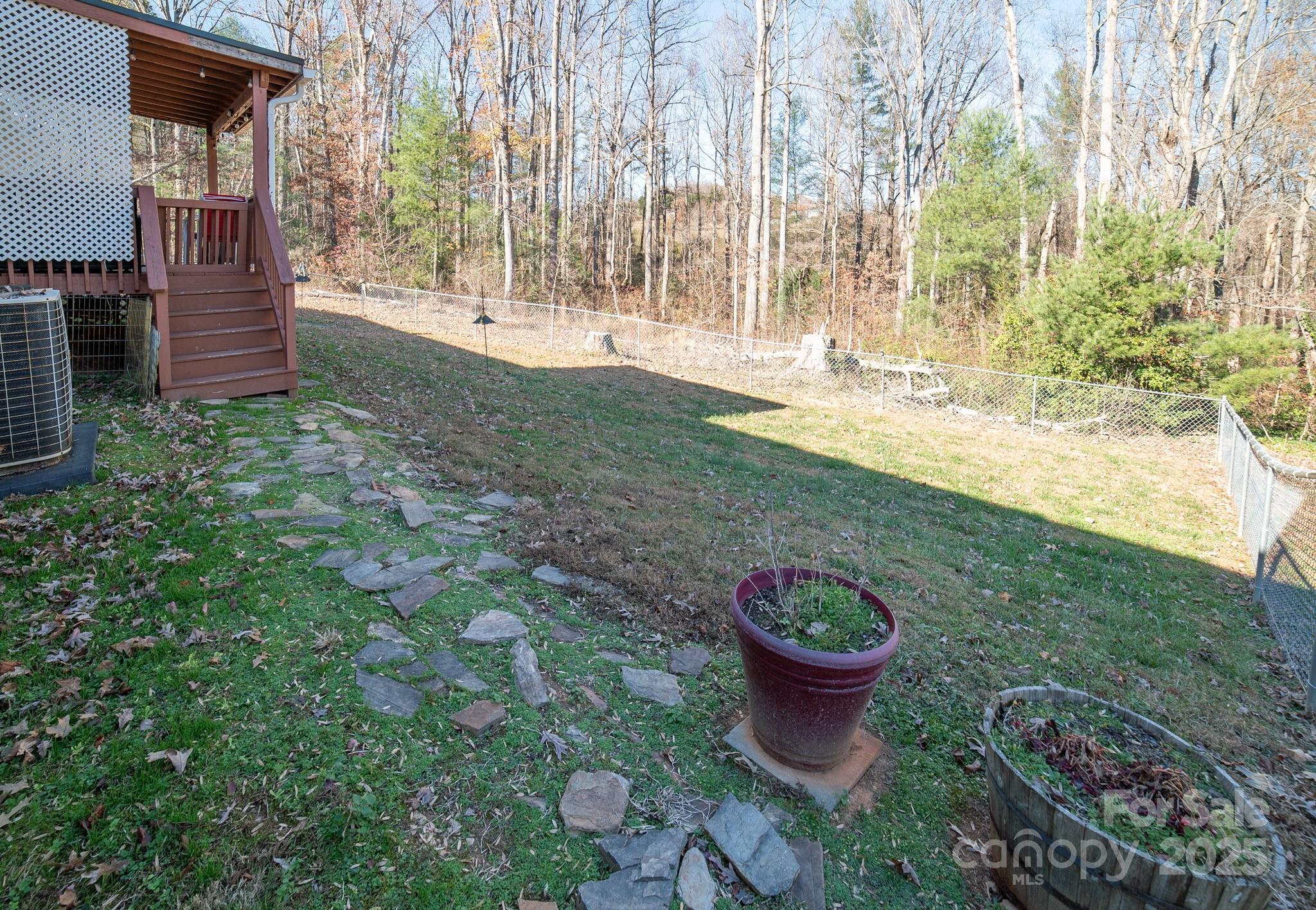 3122 Vance Denton Road Morganton, NC 28655 - Photo 31 of 42 a view of a backyard with fountain