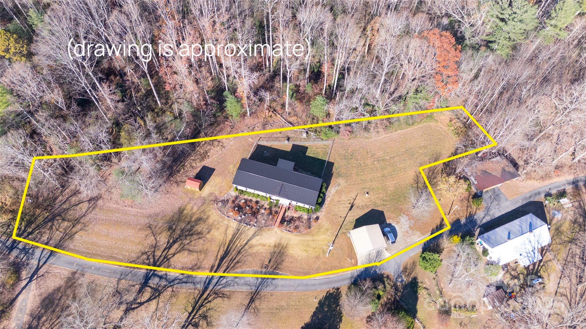3122 Vance Denton Road Morganton, NC 28655 - Photo 33 of 42 an aerial view of a house with a swimming pool