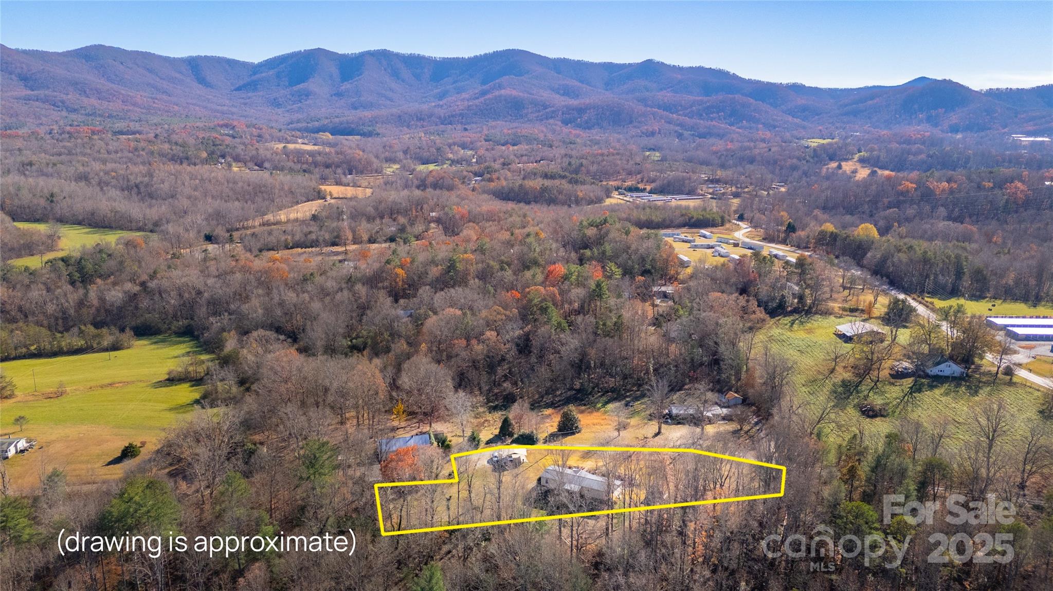 3122 Vance Denton Road Morganton, NC 28655 - Photo 35 of 42 a view of a house with a mountain and a forest