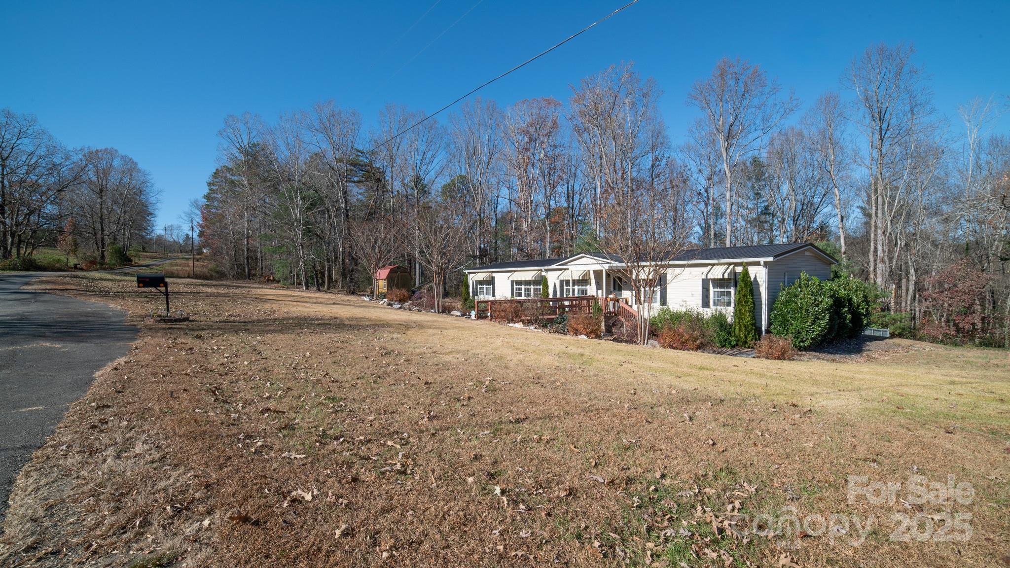 3122 Vance Denton Road Morganton, NC 28655 - Photo 37 of 42 a view of road with trees