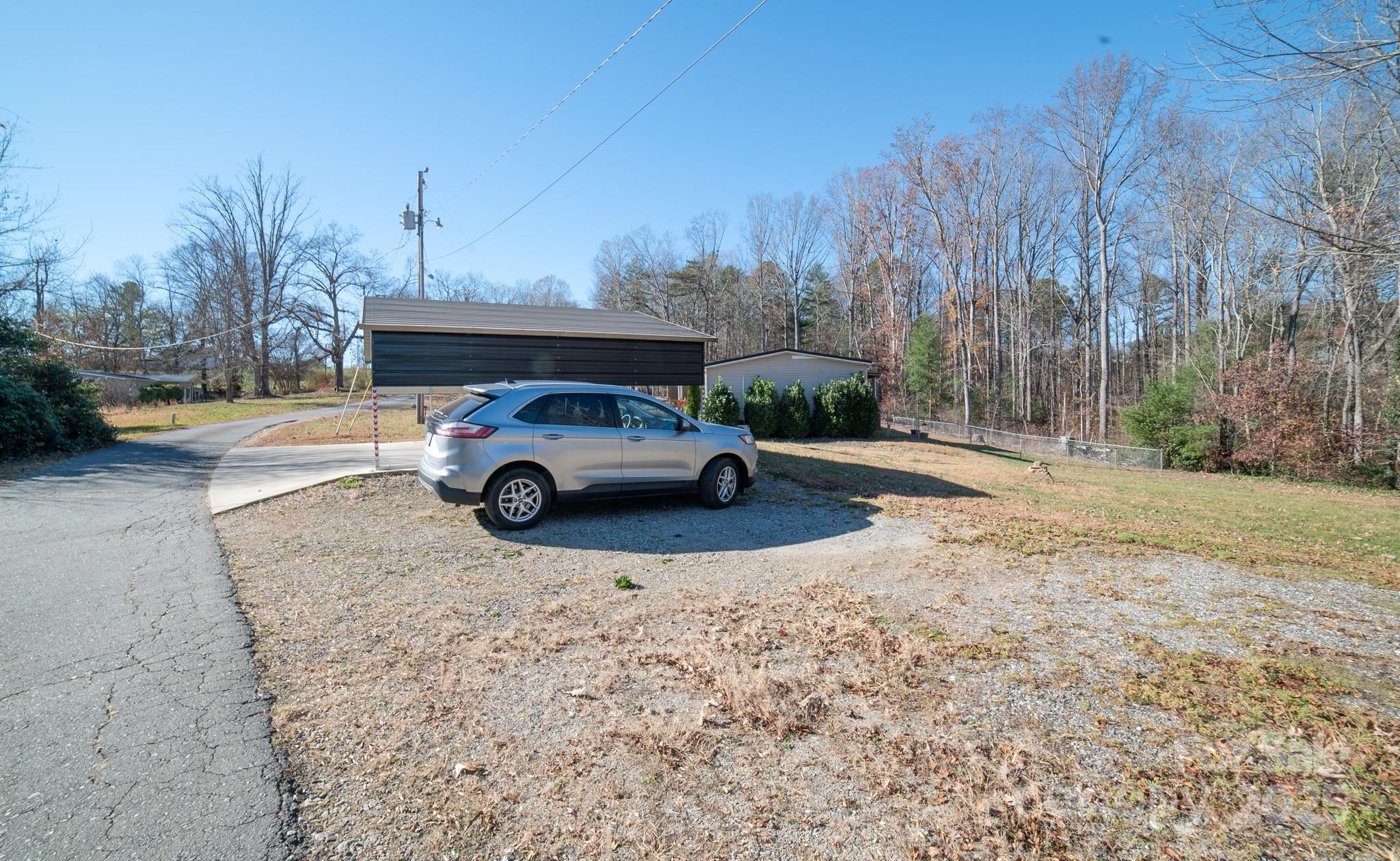 3122 Vance Denton Road Morganton, NC 28655 - Photo 39 of 42 a car parked on the side of the road