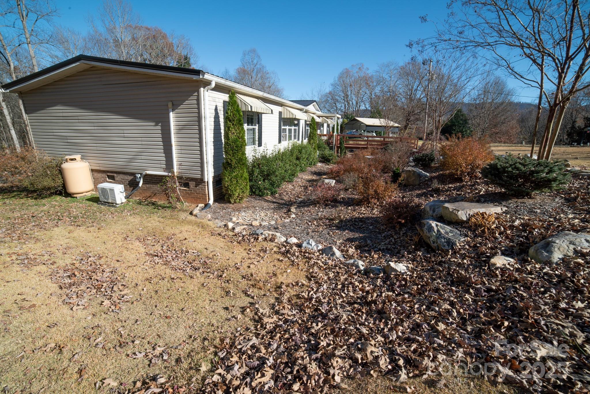 3122 Vance Denton Road Morganton, NC 28655 - Photo 41 of 42 a front view of house with yard and trees around