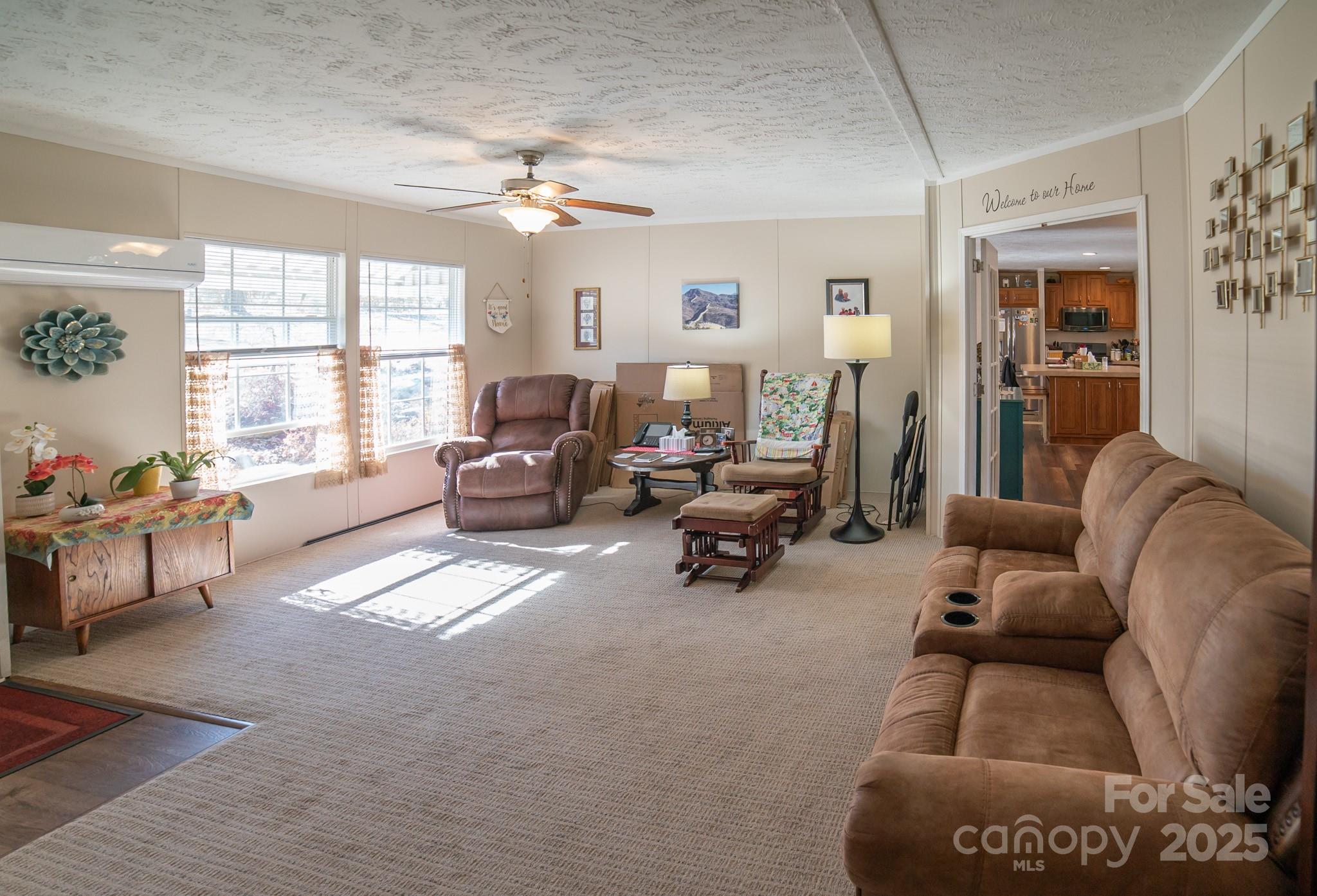 3122 Vance Denton Road Morganton, NC 28655 - Photo 5 of 42 a living room with furniture and a large window