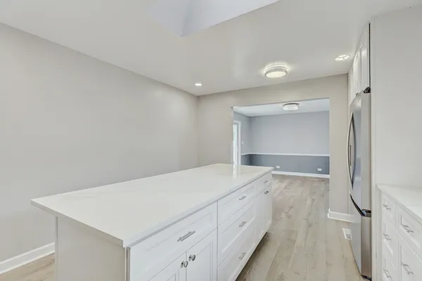 a view of storage and utility room with cabinet