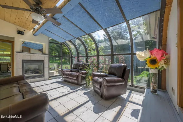 a view of a dining room with furniture window and outside view