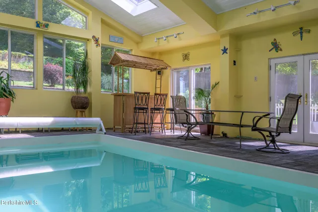 a view of a living room with furniture