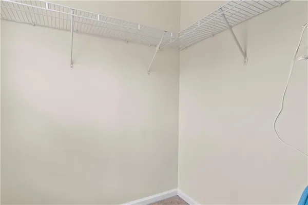 a view of small space with racks on the wall