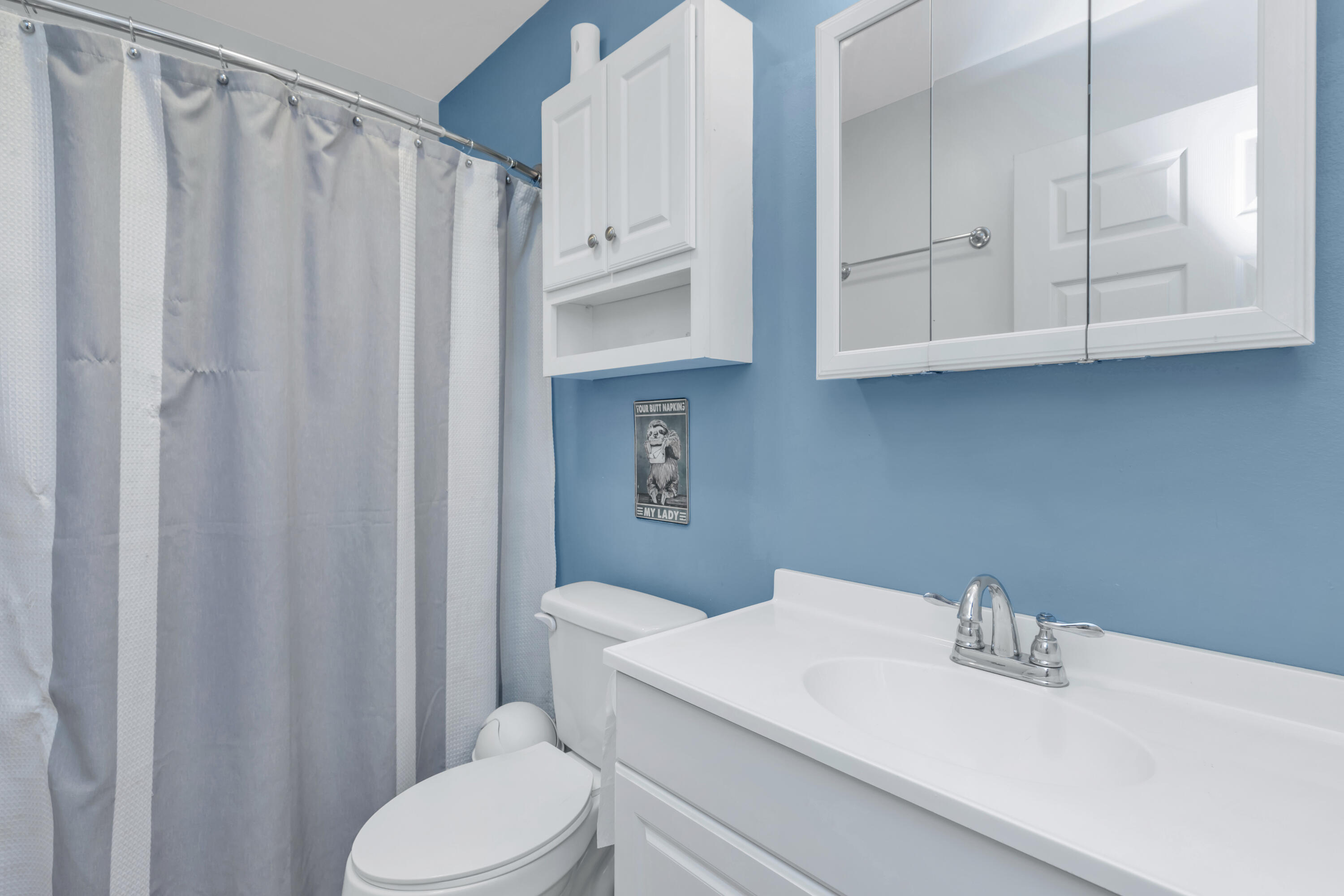 79 6th Street Santa Rosa Beach, FL 32459 - Photo 16 of 42 a bathroom with a sink a toilet and shower